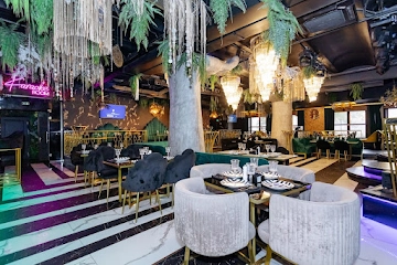 Ресторан The Jungle Restaurant Theatre